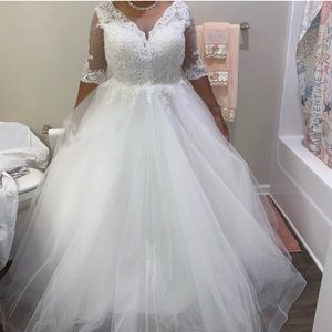 Wedding dress. Worn once 3x but corset fit like a glove